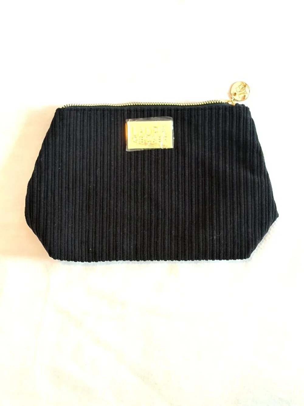 Laura Geller cosmetics bag black